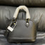 Shell crossbody bag shown styled with an outfit