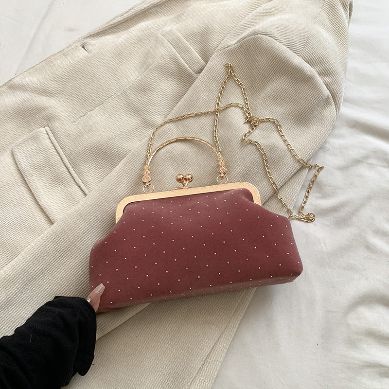 Shell crossbody bag shown from front angle