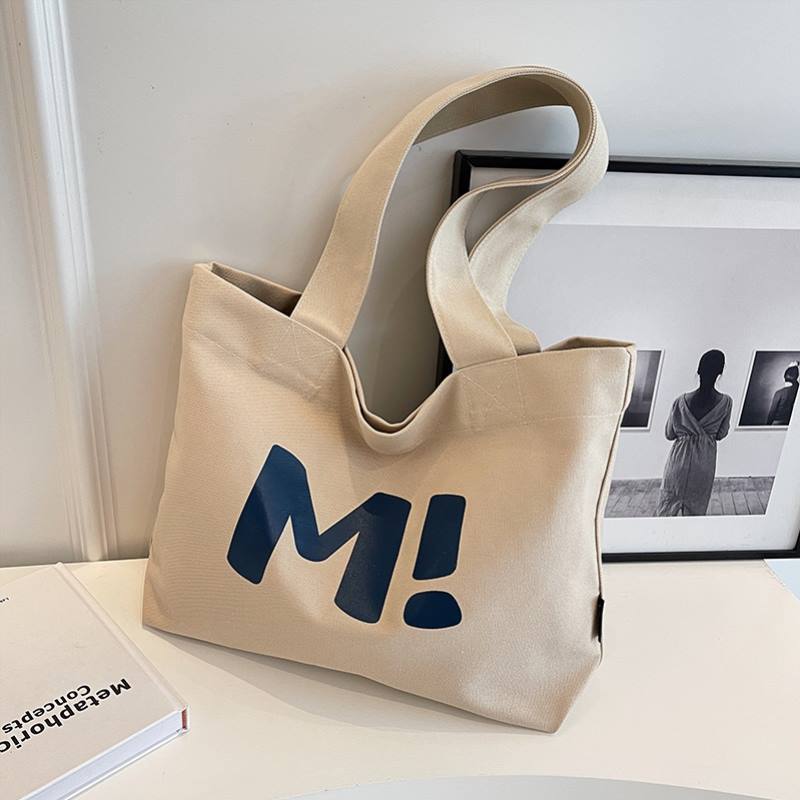 Bear motif bag shown styled with an outfit