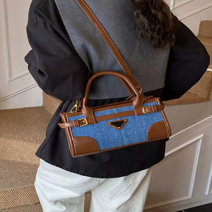 Denim patchwork crossbody bag with buckle detail — primary view Main image