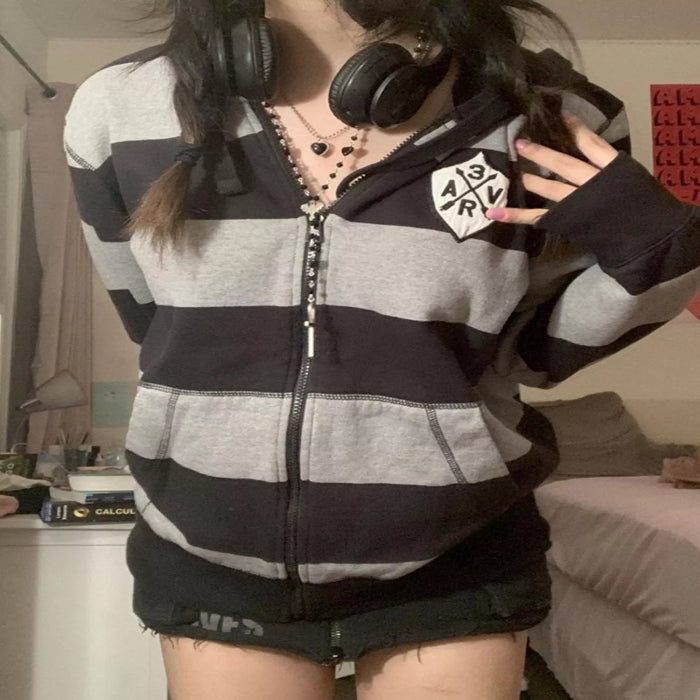 Model wearing the Striped Zip-Up Hoodie Main image