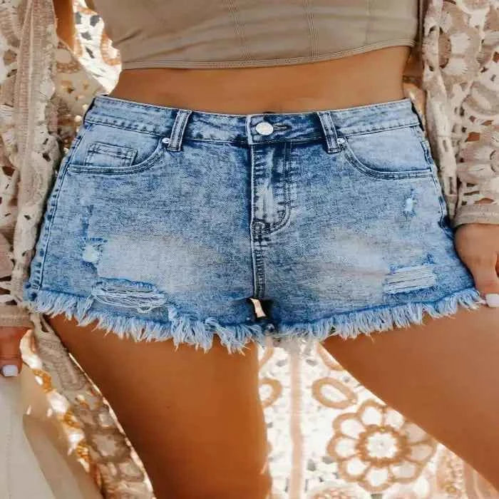 Distressed denim shorts — primary view Immagine principale del prodotto