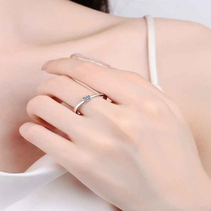 Heart-shaped moissanite solitaire ring — primary view