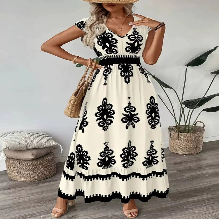 Model wearing the Ruffled Printed V-Neck Maxi Dress Main image