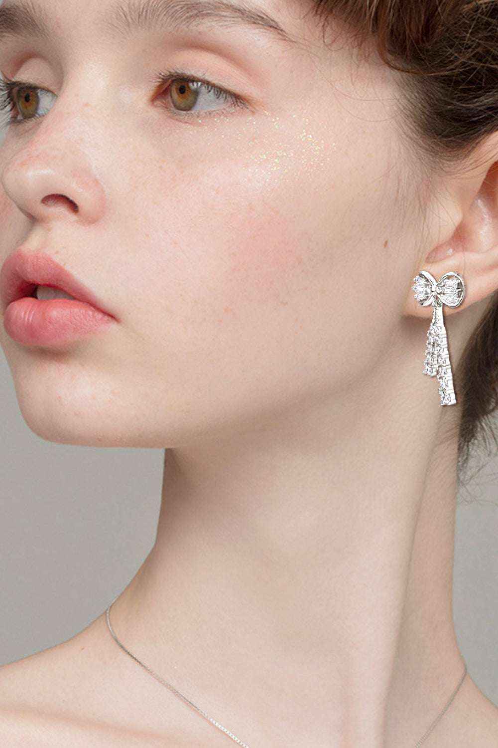 Moissanite bow stud earrings 1.12 carat in 925 silver — additional view 8
