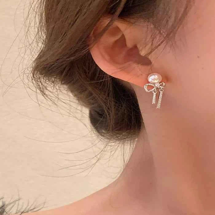Pearl bowknot drop earrings — primary view Main image