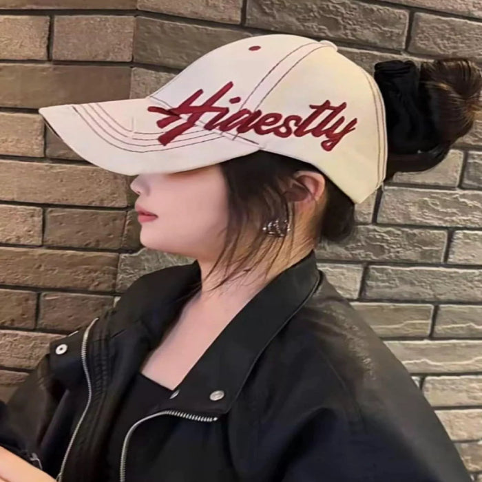 Embroidered baseball cap in off-white — primary view Main image