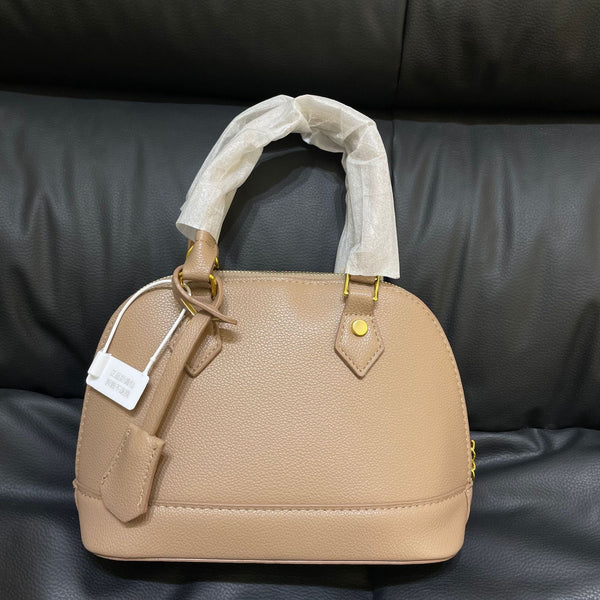 Shell crossbody bag shown from back angle