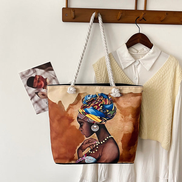 Canvas tote bag shown from side angle