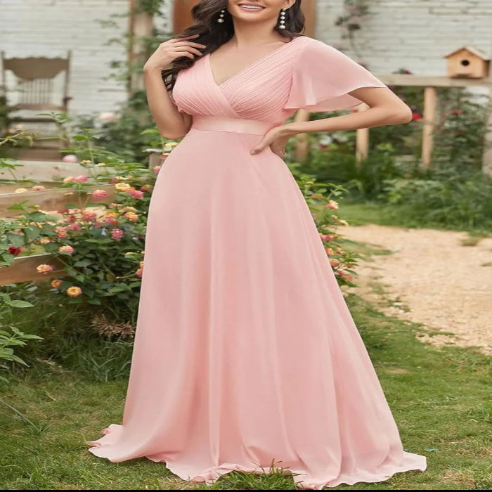 Model wearing the Surplice Flutter Sleeve Maxi Dress Main image