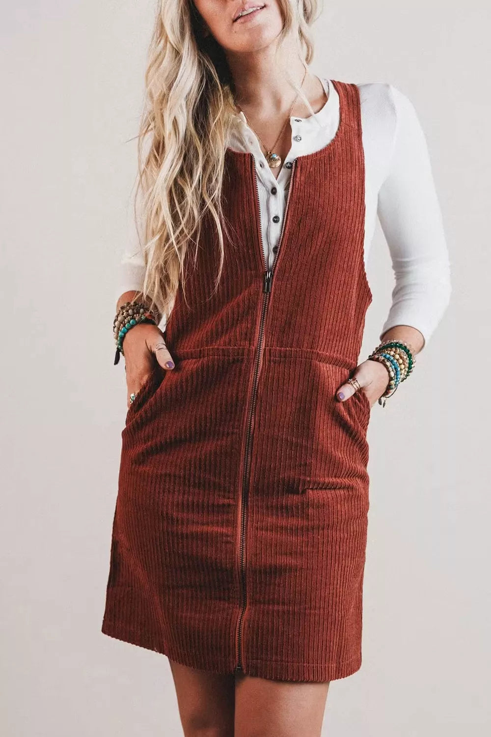 Model wearing the Ribbed Corduroy Zip-Up Sleeveless Pocket Sheath Dress Main image