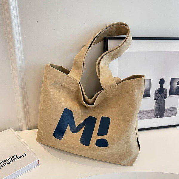 Bear print tote bag shown styled with an outfit