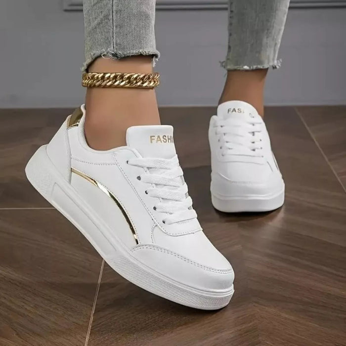 Round toe lace up sneakers in gold and white — primary view Main image
