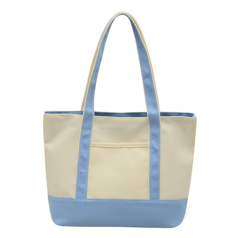 Embroidery shoulder bag adjustable strap detail