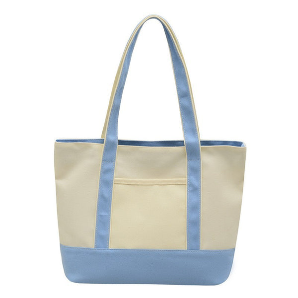 Embroidery shoulder bag adjustable strap detail