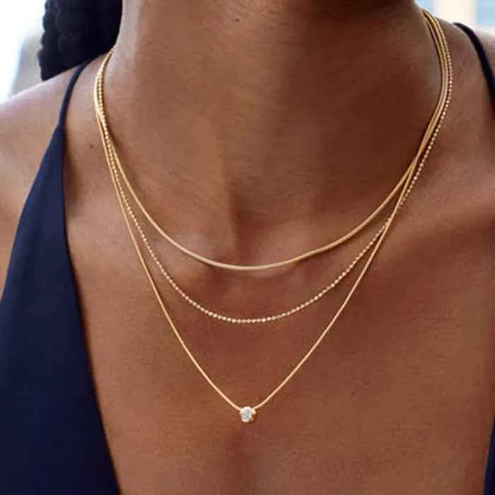 Triple chain layered necklace in 18K gold-plated finish — primary view Huvudsaklig produktbild