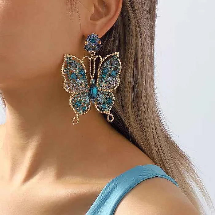Butterfly rhinestone earrings in 18K gold-plated finish — primary view Main image