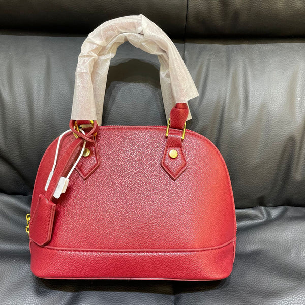 Shell crossbody bag structured shape close-up