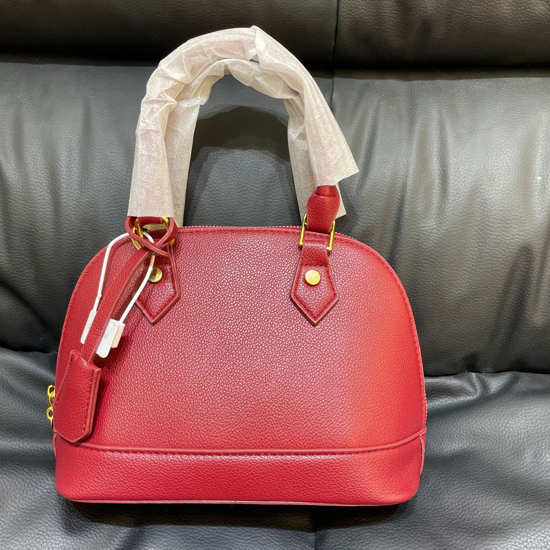 Shell crossbody bag shown from front angle