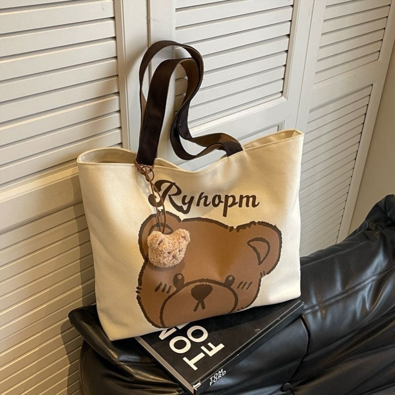 Bear motif bag shown with pendant