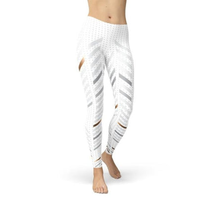 White leggings with black pattern worn by a person on a white background